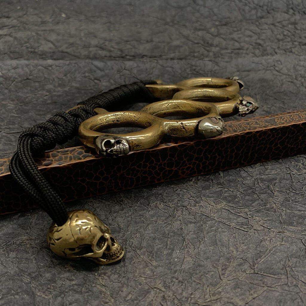 Aged Brass Knuckles with Decorative Skull Beads 135g Paperweights