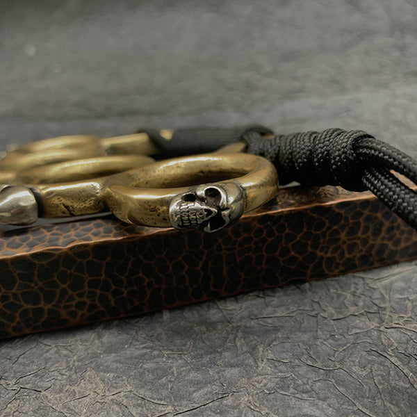 Aged Brass Knuckles with Decorative Skull Beads 135g Paperweights